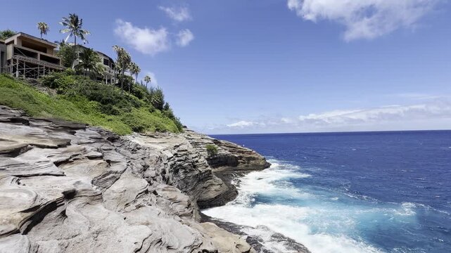 Tuff coast refers to a shoreline formed by tuff. Spitting Cave, East Honolulu, Oahu island, Hawaii.  Vent deposits, Koko member, Honolulu Volcanics.  Coastal erosion, Pacific Ocean
