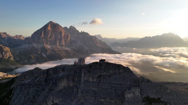 Aerial View of Stunning Scenery of Dolomites, Italy, Clifftop Hut and Fpg Above Valley on Golden Hour Sunlight