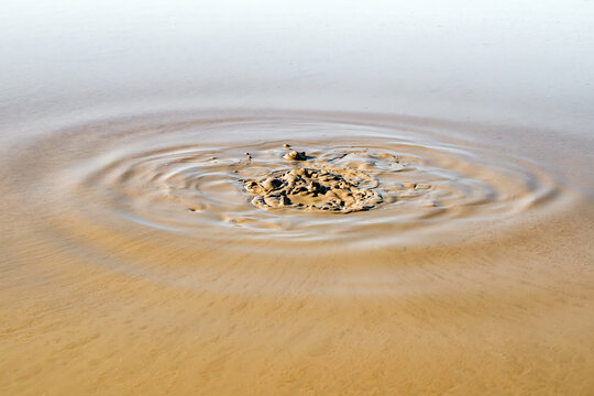 release of gases bubbles and bubbling on surface of mud volcano