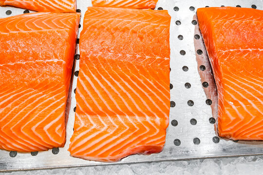 fresh salmon on ice in supermarket