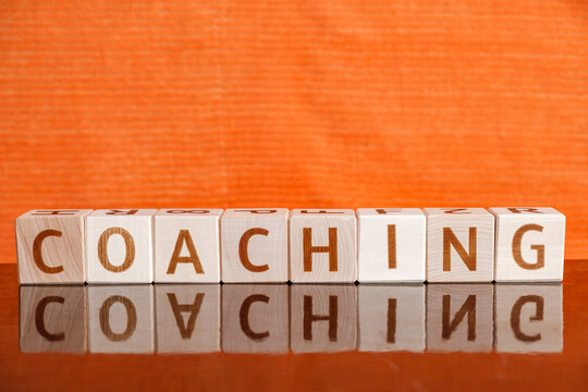 word Coaching, from letters on wooden cubes