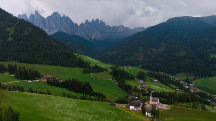 Obraz premium View of Val di Funes with the Chruch of Santa Maddalena in the Dolomites Mountains. Italy 