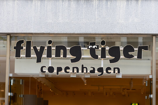 's-Hertogenbosch, Netherlands - September 30, 2026: Flying Tiger Copenhagen store sign displayed above the entrance of a retail shop in the city center.