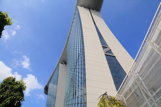 SINGAPORE CITY, SINGAPORE - MARCH 11, 2024: Landmark Marina Bay Sands hotel, casino and resort in Singapore City. It was designed by Moshe Safdie architects.