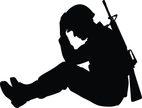 Silhouette of depressed soldier sitting on ground with rifle, crying from war trauma, PTSD, stress, and military combat despair