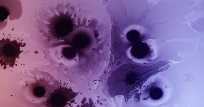 Paint blot. Spreading ink. Defocused purple blue pink color pigment droplet water texture floating on abstract neon acrylic background.