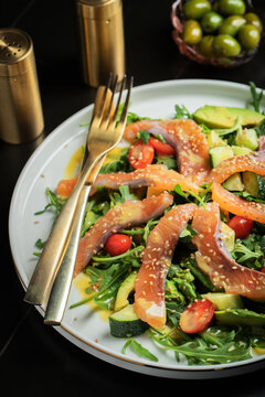 Salad with salted salmon and arugula