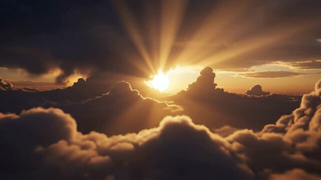Cinematic aerial view of golden sunbeams piercing through fluffy clouds at sunrise for background sunset