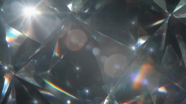 Diamond facets refract light creating rainbow flares with lens distortion during a close up macro shot
