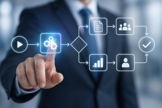 Corporate executive interacting with transparent touchscreen flowchart to model workflow automation, streamline business processes, monitor analytics and optimize digital operations interface