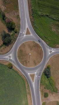 Rural Road Roundabout with Low Traffic and Vehicles in Lombardy Italy
