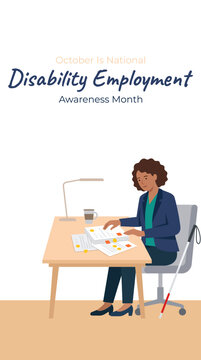 Blind businesswoman working at her office desk for National Disability Employment Awareness Month