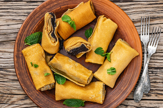 sweet thin rolled crepes with poppy seed