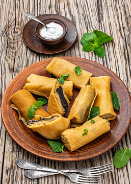 Sweet thin crepe rolls stuffed with poppy seed