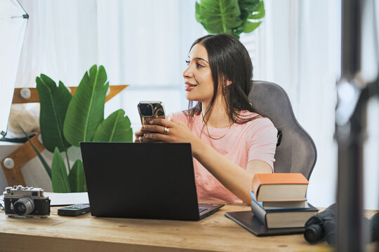 Cropped portrait of an attractive young businesswoman working on her laptop while sitting in the office.