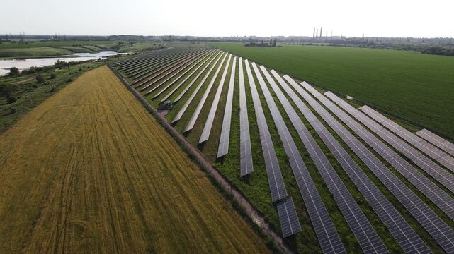 Solar panel farm generating renewable energy and innovation with an aerial view of a solar plant producing sustainable electricity