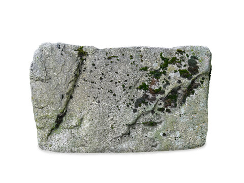 Granite stone block covered with moss isolated on white background.