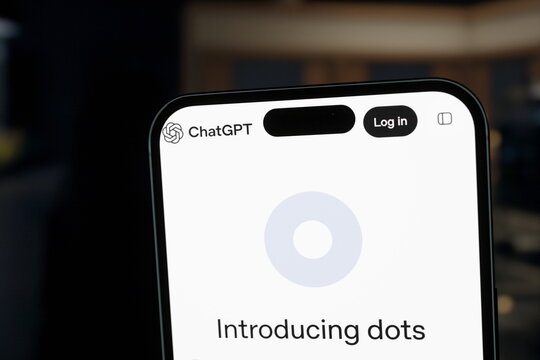 Close-up: the dots website displayed on a smartphone screen. OpenAI Cancels AI Model Over Safety Concerns, Launches 'dots' Agent Tool. September 30, 2026, Lisbon, Portugal.