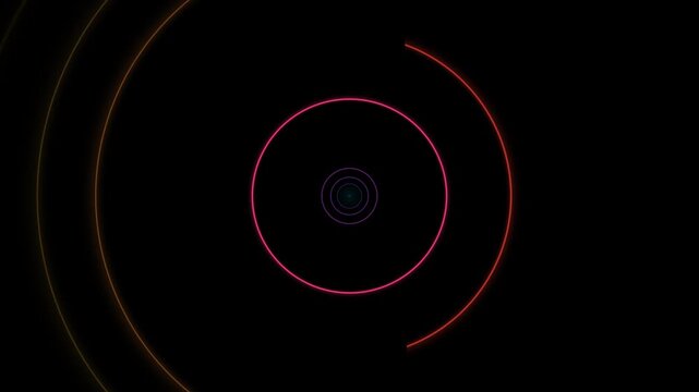Abstract concentric circles in vibrant colors on a dark background, tunnel effect