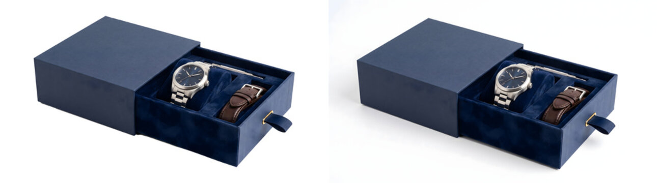 Watch box mockup in navy blue with sliding drawer and velvet cushions holding a steel wristwatch and spare brown leather strap on white background