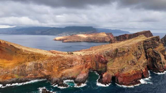 Drone footage of steep coastal cliffs at Ponta de Sao Lourenco, Madeira, Portugal. Coastal sightseeing and nature tourism
