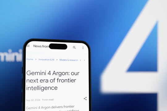 High-angle view: the official Gemini announcement page displayed on a smartphone screen. Google unveils its new Gemini 4 Argon AI model. October 1, 2026, Lisbon, Portugal.