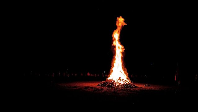 Large Bonfire Burning Blazing High Flame in the Pitch Dark Night