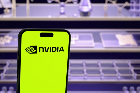Low-angle view: the Nvidia logo displayed on a smartphone screen. Nvidia launches a new AI safety platform designed to monitor and control autonomous AI agents. September 30, 2026, Lisbon, Portugal.