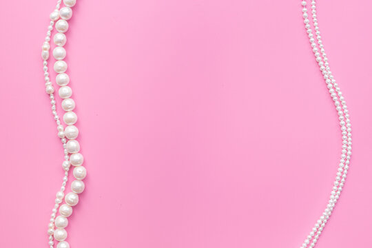 Natural white pearls - beads for jewelry, top view. Precious and elegance concept background