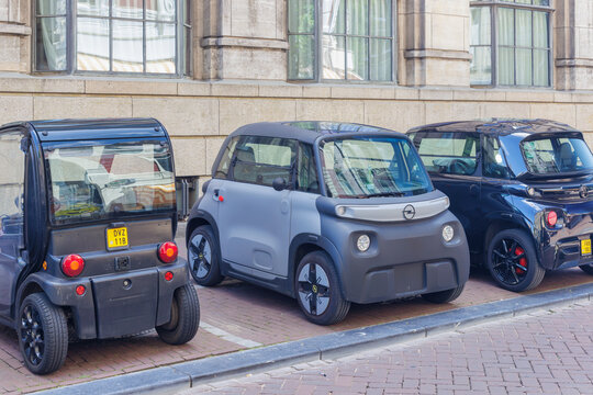 Parked electric micro cars in the city center of Amsterdam, The Netherlands on July 2, 2026