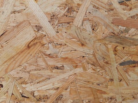  OSB Board Texture Close-Up, Wood Chipboard Background with Pressed Wood Chips