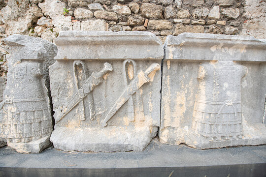 Side Ancient City. This photograph shows ancient stone blocks and relief fragments displayed in the open-air exhibition area of ​​the Side Museum.