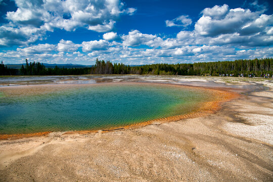 Yellowstone Midway Basin boardwalk and Excelsior Geyser Crater summer landscape.