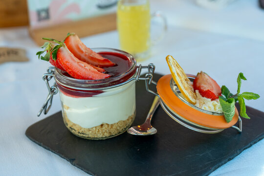 Delicious tiramisu dessert served in Italian restaurant with cocoa and creamy layers