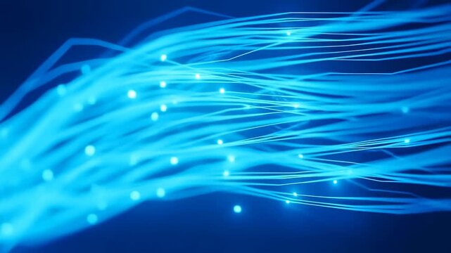 Blue fiber optic light trails stream through an abstract digital space. Technology presentations, telecommunications advertising, and internet service promotion.