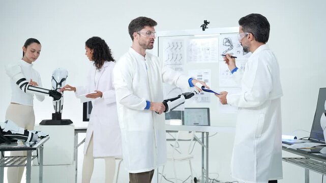 Team of researchers collaborates in a modern laboratory, discussing robotic prosthetic prototypes and reviewing technical blueprints on a glass board to advance engineering and innovation.