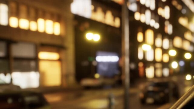 Bright lights illuminate storefronts and vehicles line the streets, creating a lively urban scene. The atmosphere buzzes with the energy of nighttime city life.