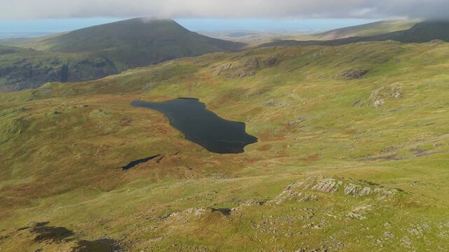 Aerial panoramic views from the Yewbarrow North Top to the Wasdale Head, Wast Water, Scafell, Kirk Fell.  Scenic Drone POV Exploration of the Lake District National Park, Cumbria, UK.