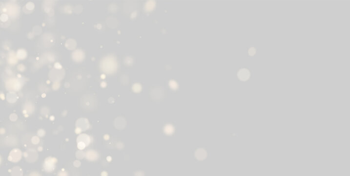 Soft bokeh lights create a warm, out-of-focus effect with golden and beige tones. Circles vary in size and opacity, scattered mainly on the left side. This background is ideal for elegant.