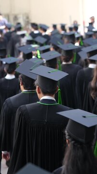 	
backside graduation hats during commencement success graduates of the university, Concept education congratulation. Graduation Ceremony ,Congratulated the graduates in University during commencement