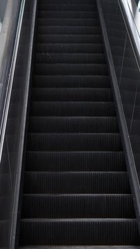 Up escalators in public building, nobody.