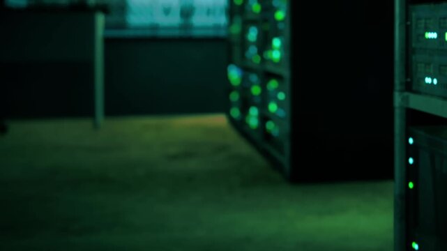 A dimly lit data center showcases rows of servers, emitting a soft green light. The atmosphere feels both futuristic and calm, highlighting the importance of technology in our lives.