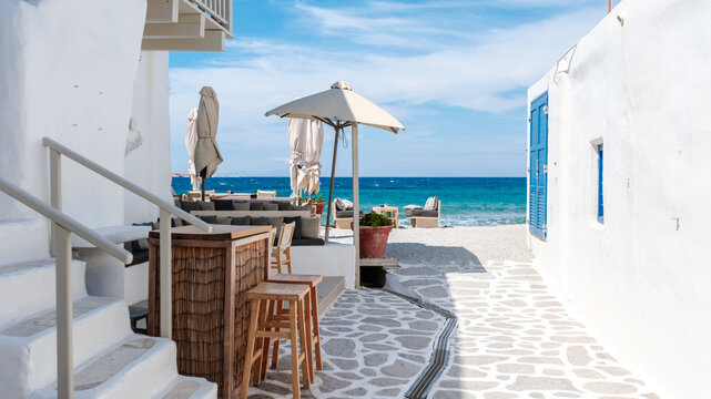 Charming streets of Naousa, Paros, Greece, bustling with vibrant colors and local shops