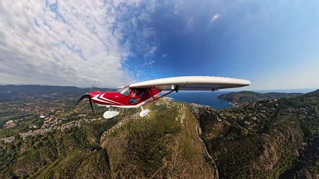 selfportrait Point of view of light airplane leaving the bay of Cannes over the Esterel mountain, French Riviera