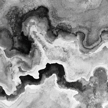 Black, white and gray marbled fluid swirl with layered wavy veins