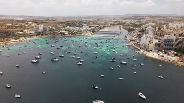 Saint Paul's Bay with Boats and Hotels in Malta Aerial View