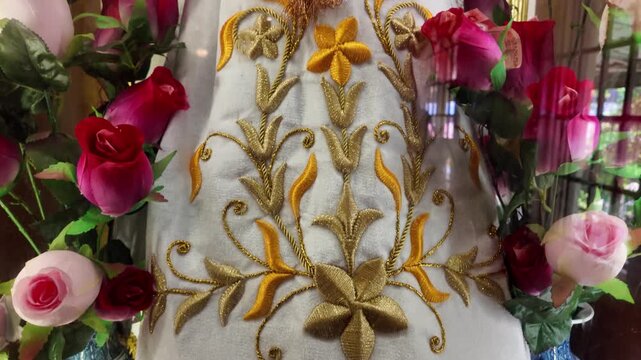 Embroidered statue robe with flowers at Simala Shrine in Cebu