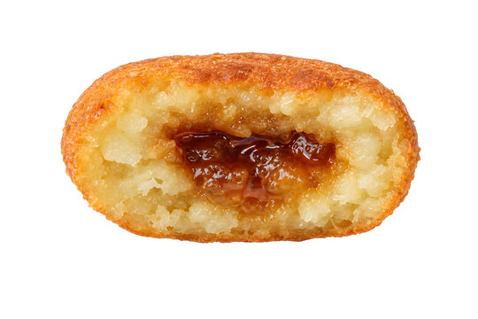 Oval Indonesian cassava misro fritter cut open showing melted palm-sug Isolated on White Background