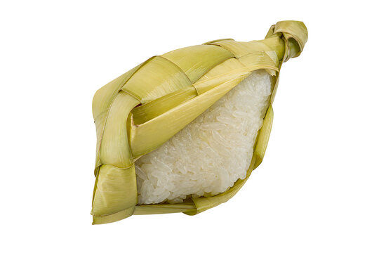 Traditional ketupat woven palm-leaf rice cake partly opened to show Isolated on White Background