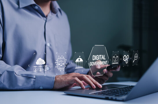 Digital government and e-governance concept. Person using laptop with digital government interface, data management, technology-driven public services, security infrastructure, online administration